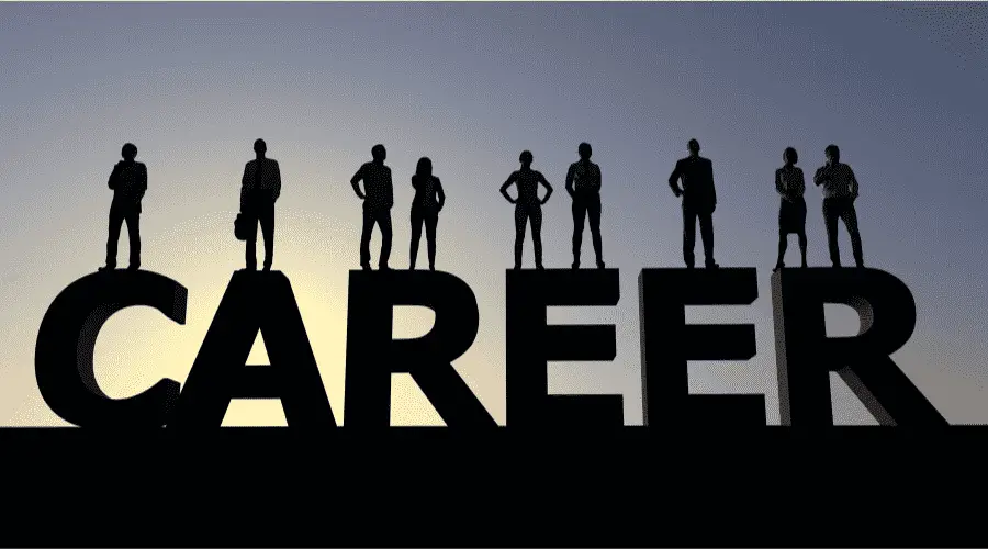 Image embedded of people standing on a large shadowed statue of the word career. 