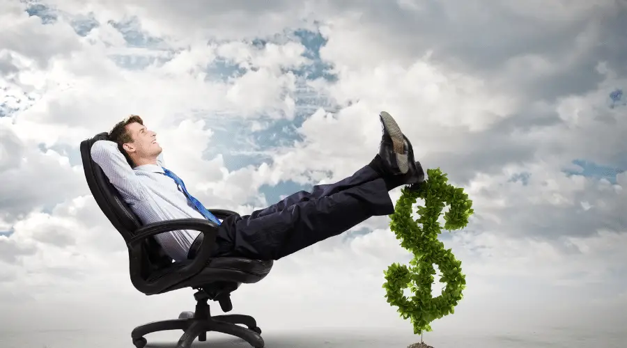 The embedded image of a man on a chair with feet resting on a dollar sign represents lifetime earnings